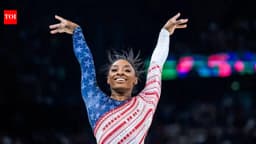 Simone Biles screams “CRAZY” as Katelyn Ohashi spills ...