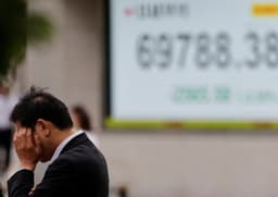Asian shares fall on chipmaker drag; US jobs data looms
