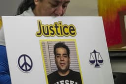 An ICE officer is charged with assault for striking a man ...