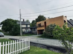 Abutter seeks injunction to stop work on guest house in Southwest Harbor