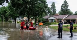 Midwest Officials Warn Flood Risk Escalates After Record Rain Traps Drivers