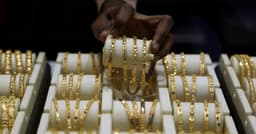 Gold rises on soft US jobs data, weaker oil; nonfarm payrolls in focus | Reuters