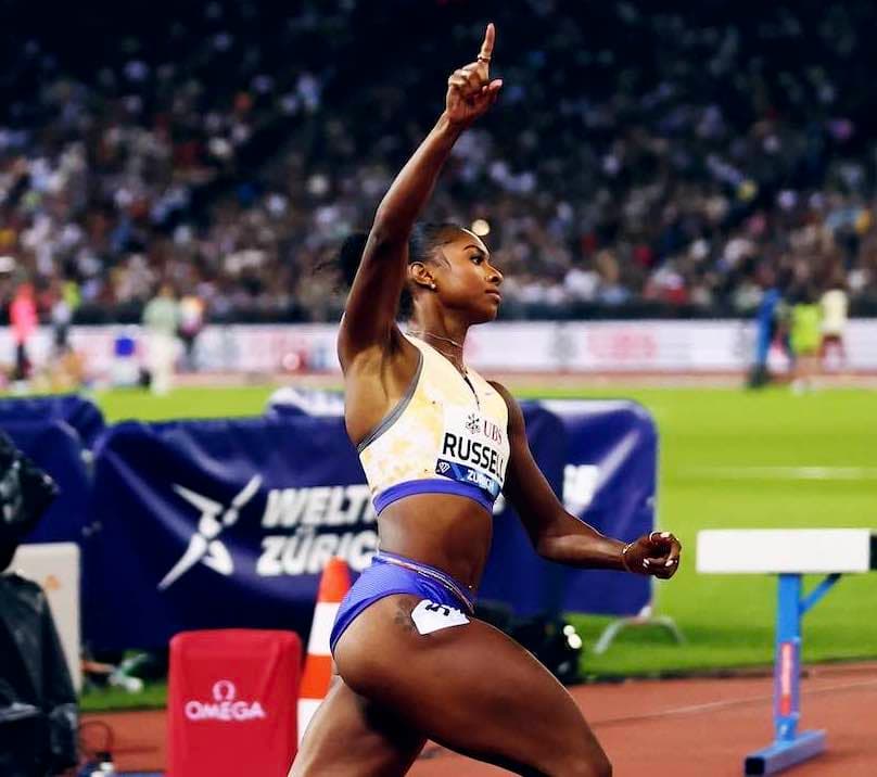 2 World records: Russell 12.09 and Dos Santos 45.80, also ...