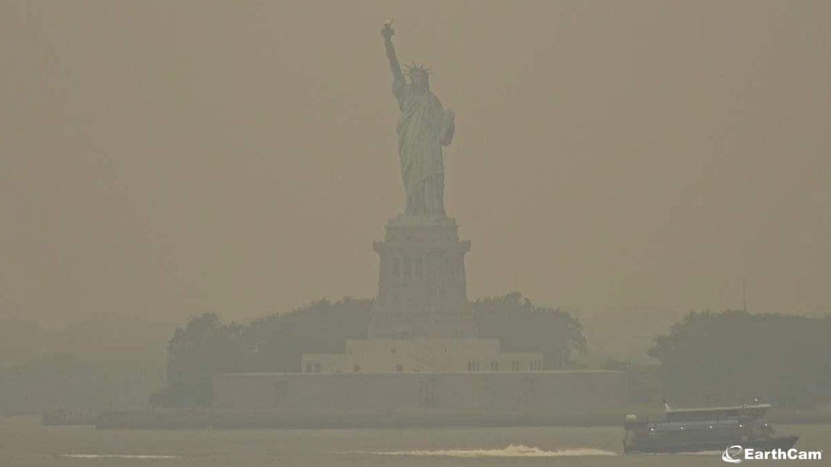 Global warming's ill wind blows over Wall Street, London 