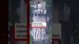 Police fire water cannon at crowds on outskirts of Belfast. #BBCNews