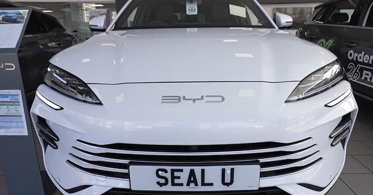 Global EV sales weakness/stabilization vs regional surges/oil shock renewal, OEM retreats/expansions/impairments ($70B+), Tesla/BYD/Toyota/Ford/Kia/GM/Rivian/VW/Hyundai/Stellantis duel & hybrids/used surge