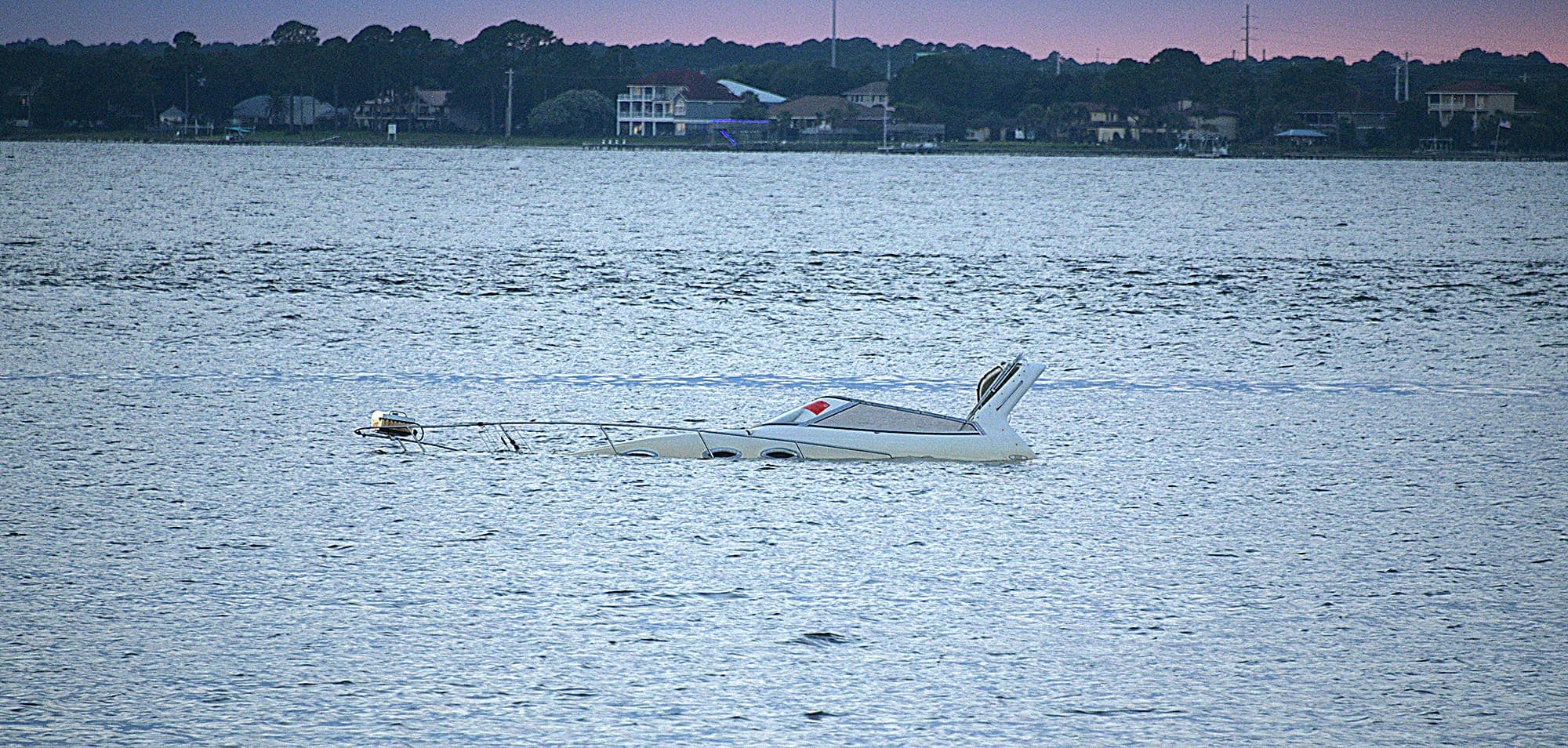 Boat sinks near Juana's, fire district responds