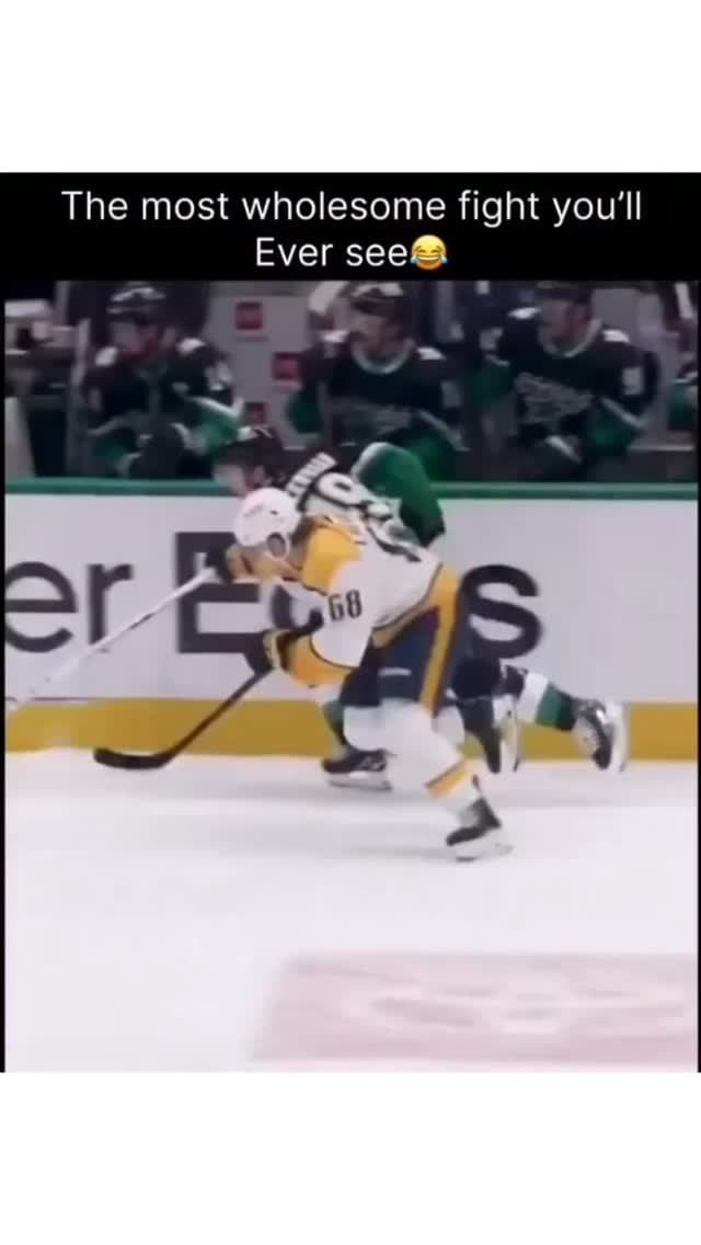Nashville Predators and Dallas Stars players engage in a ...