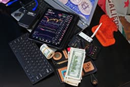 Q1 revenue climbs as investors weigh legal overhangs and valuation