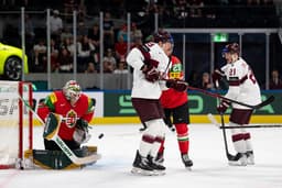 Latvia routs Hungary 8-1 to reach quarterfinals at ice hockey worlds