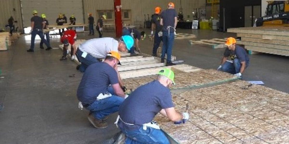 John Deere workers, Habitat for Humanity partner to help build 30 homes in Iowa