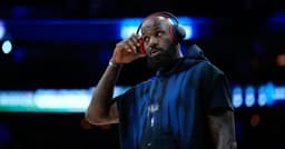 LeBron James tosses chalk, gets 76ers intro for 1st time in ...