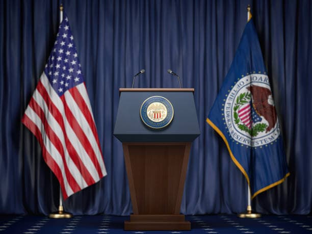 Fed Policy Under New Chair Warsh: Rate Hold, Internal Divisions, QT vs Rate Hikes