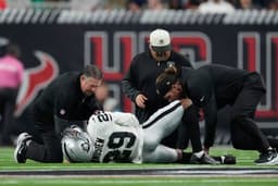 Raiders cornerback carted off field in Houston with knee ...