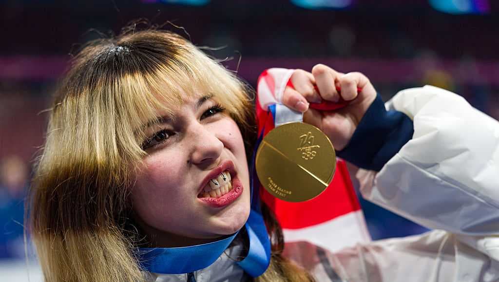 Figure skater Alysa Liu's hair and smiley piercing at Milan ...