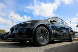 Tesla tempers robotaxi promises as rollout slow