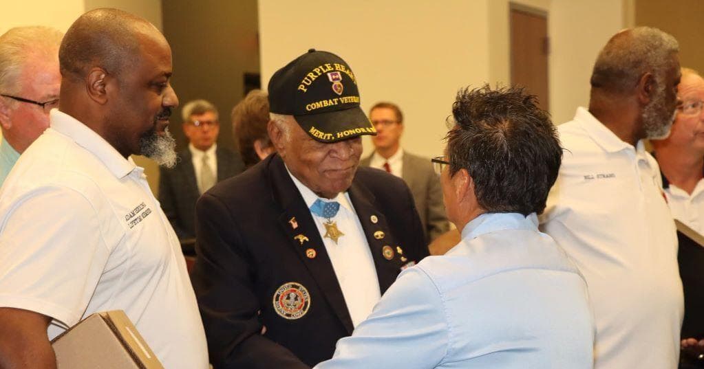 'A living hero': City, county honor Maj. Capers
