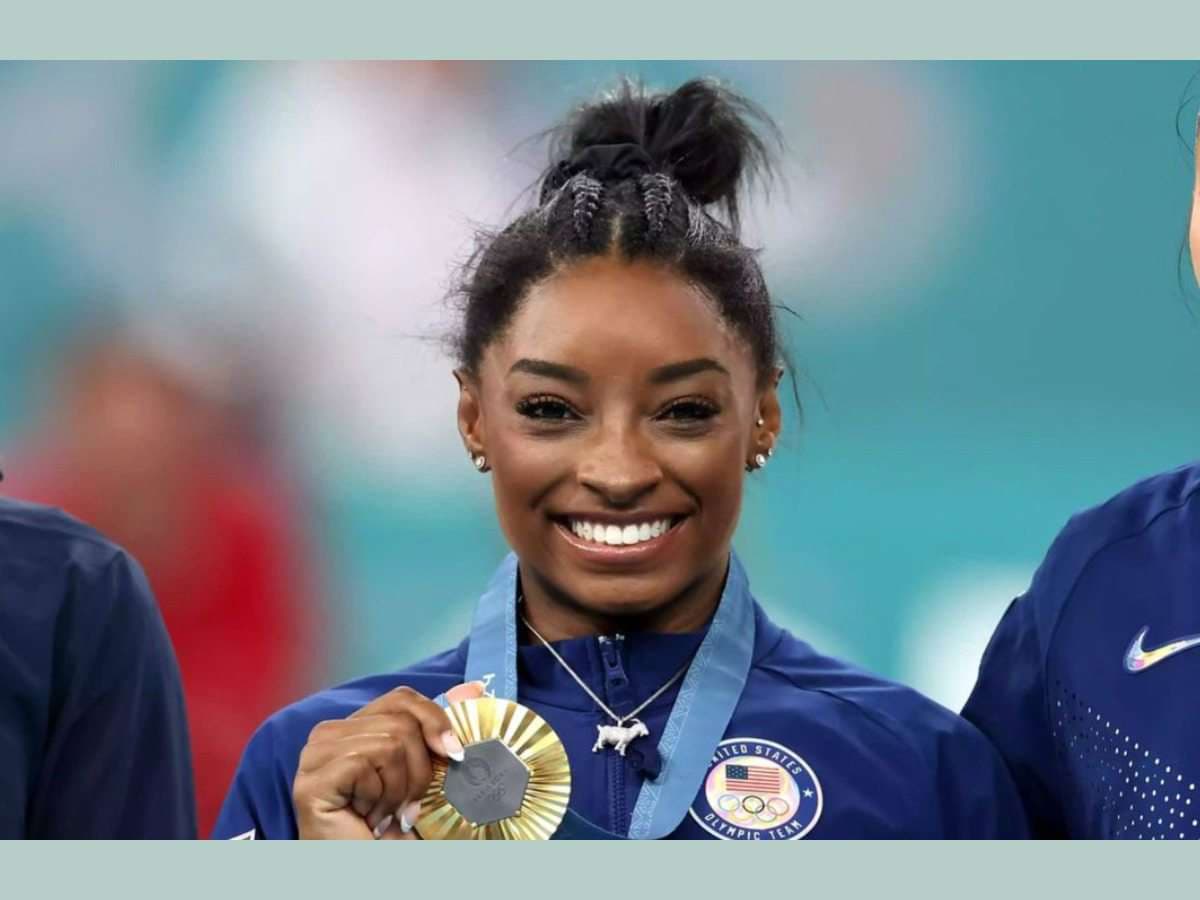 The story behind Simone Biles' iconic GOAT necklace and ...