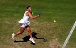 Marta Kostyuk's bridal-inspired dress turns heads at ...