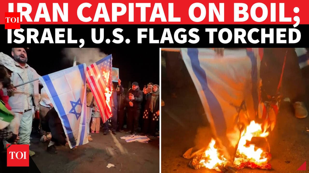 'DEATH TO AMERICA': Iranians Burn Israel & U.S. Flags In Tehran; Declare 'WAR NOT OVER YET' | WATCH