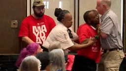 Kansas City protester handcuffed at Royals stadium meeting