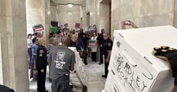 Federal Judge Strikes Down Arkansas Petition Laws, Sending Key Rules to Trial