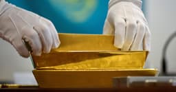 HSBC lowers 2026-27 gold price forecasts on hawkish Fed ...
