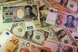 Dollar mixed after flat PPI, rate hike bets cool