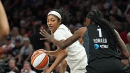 Angel Reese turns heads again with eye-catching pink Givenchy outfit before Dream game