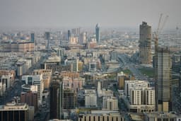 Saudi authorities say 2 killed by falling debris at oil facility following drone attacks in kingdom
