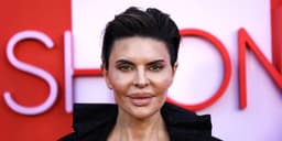 Lisa Rinna Turns Heads at American Music Awards in Oversized Suit with Mysterious Tie Detail - Photos