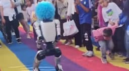 Chinese Robot Wearing Blue Wig Viciously Kicks Young Child In The Stomach [VIDEO]