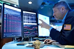 US futures climb ahead of Fed interest rate call, retail sales numbers