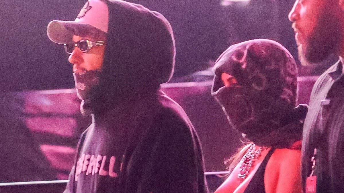 Kim Kardashian sweetly links arms with boyfriend Lewis Hamilton as romance heats up at Justin Bieber's Coachella set | Daily Mail Online