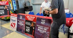 Democrats ask judge to block Trump order tightening mail-in voting | Reuters