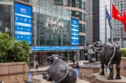 Hong Kong shares close higher, Zijin Mining surges 9pc
