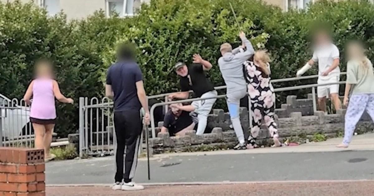 Street fight breaks out between families wielding studded planks and metal poles | News UK | Metro News