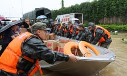 Xi urges all-out efforts in flood control, disaster relief