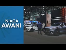 Automakers push EVs despite market slump