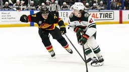 Hughes scores in return to Vancouver, Minnesota Wild ...