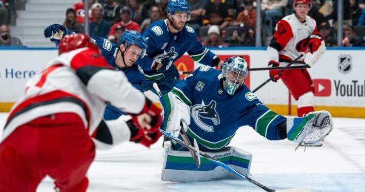 Hurricanes hand slumping Canucks 6-3 loss