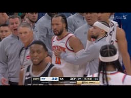 Jalen Brunson scores the tough layup and holds his left ankle in pain in Game 1 of the NBA Finals