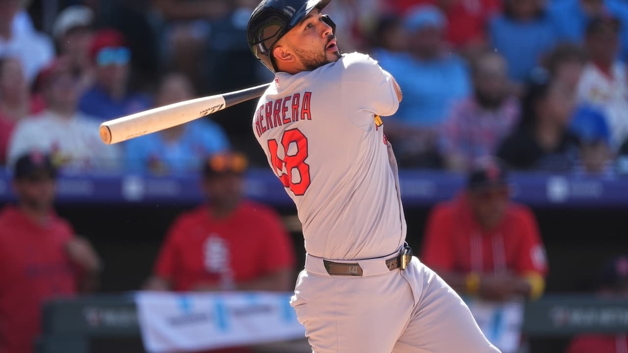 Herrera and Hjerpe lead Cardinals to a 10-8 win over the Rockies