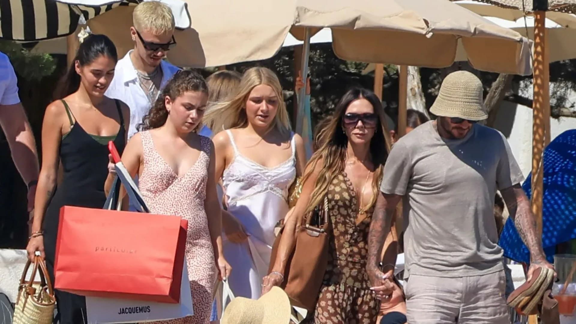 Victoria Beckham stuns in gold bikini for yacht trip with David