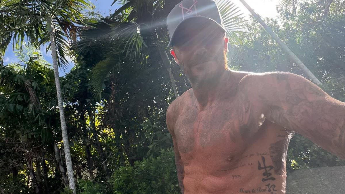 Shirtless David Beckham shows off his tattoos and ripped abs in Miami after his son Cruz confirmed Victoria removed all her inkings | Daily Mail Online