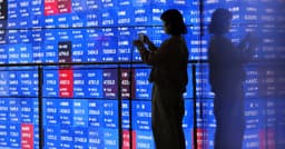 Markets on edge as Trump threatens strikes on Iranian infrastructure | Reuters