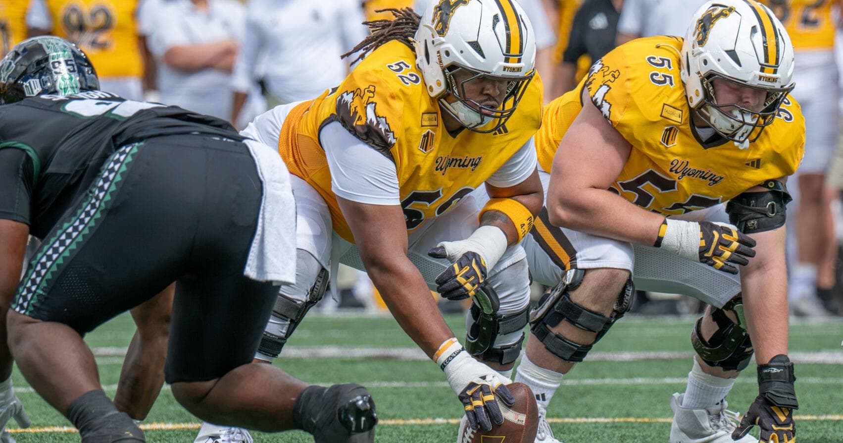 Young offensive line reorganizes around season-ending center injury