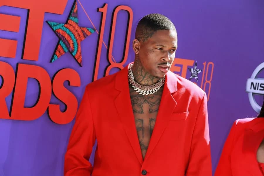Rapper YG briefly detained as police search property in ...