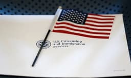Trump administration revives rule that could deny green ...