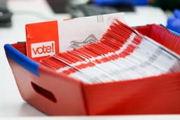 Court lets Trump’s executive order limiting mail-in voting stand, for now